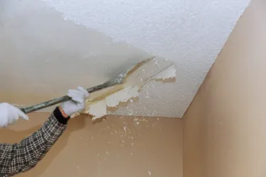 Popcorn ceiling removal in progress