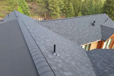 Completed dark asphalt shingle roof